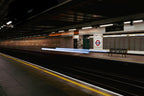London Underground platform at night with long exposure train lights, architectural fine art print